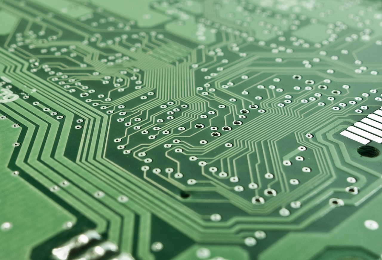 gavel and digital circuit board symbol of law