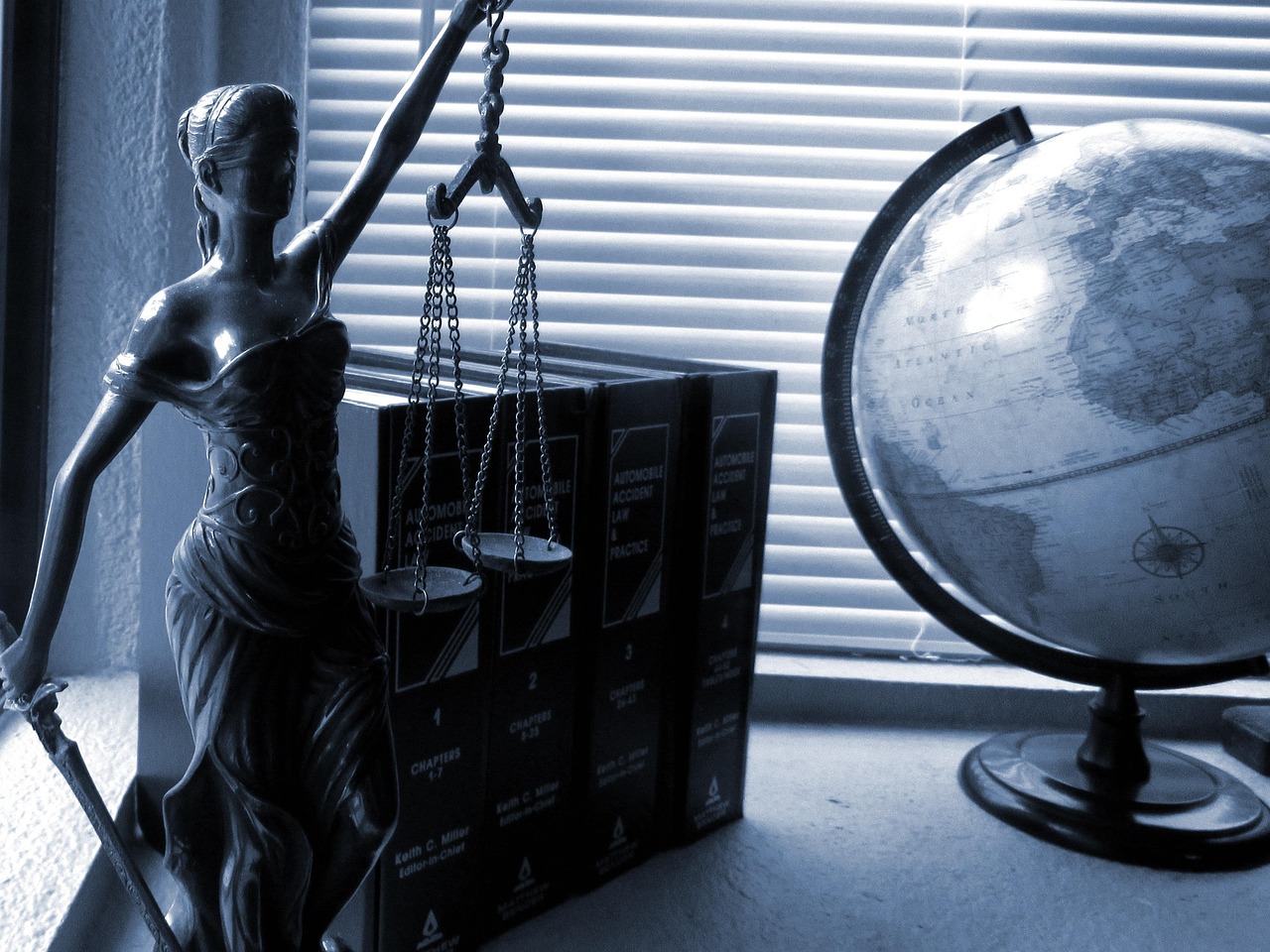legal balance scale with digital circuit patterns