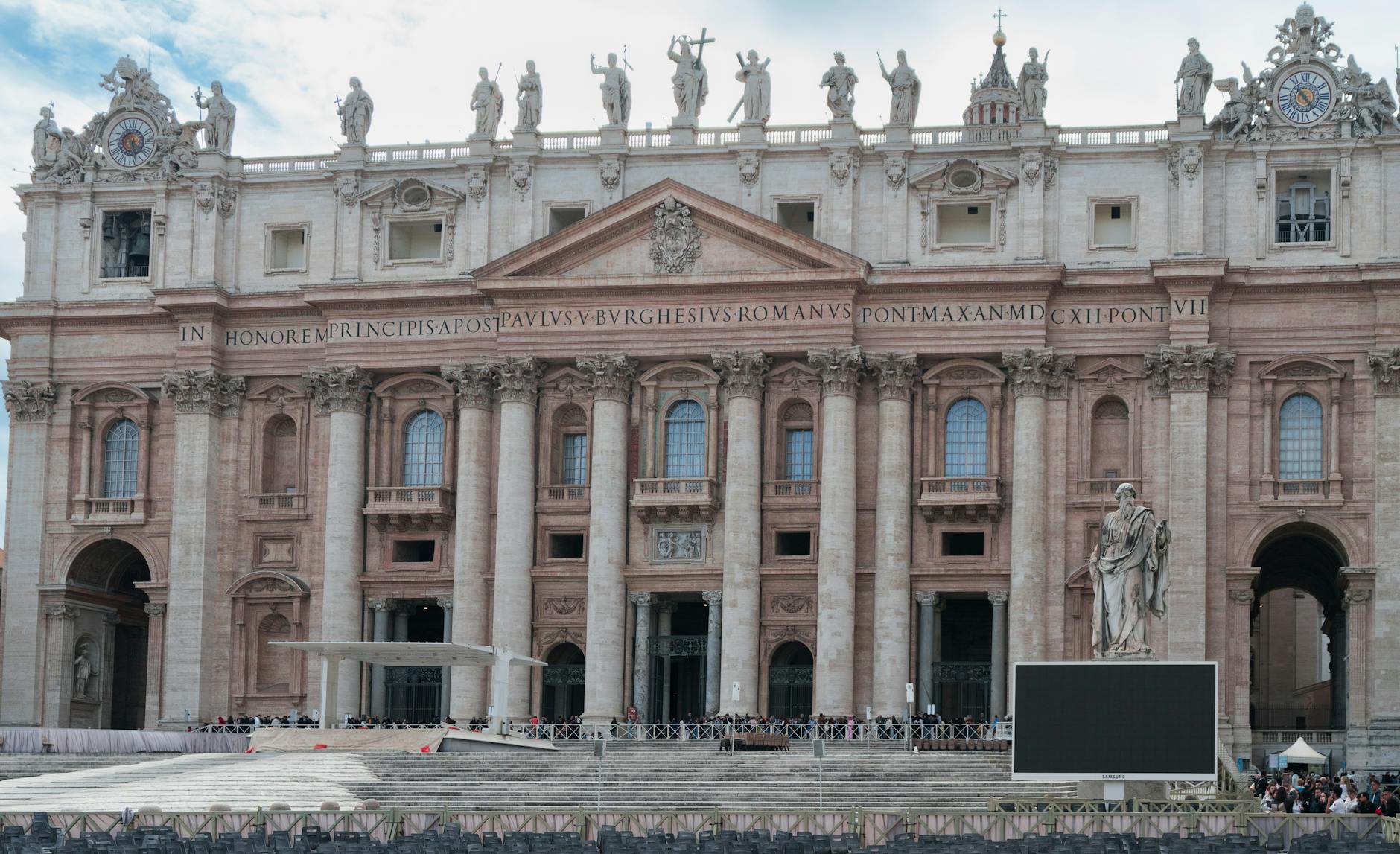 Detailed view of the iconic St Peter's Basilica front in Vatican City, highlighting its architectural grandeur.