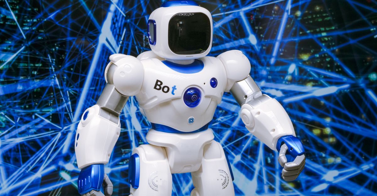 futuristic humanoid robot hands holding light orb