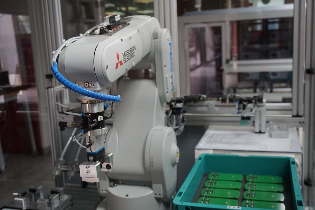 Robotic arm assembling microchip in clean data center, server room background, cool cyan lighting, human engineer monitoring holographic interface, industrial automation