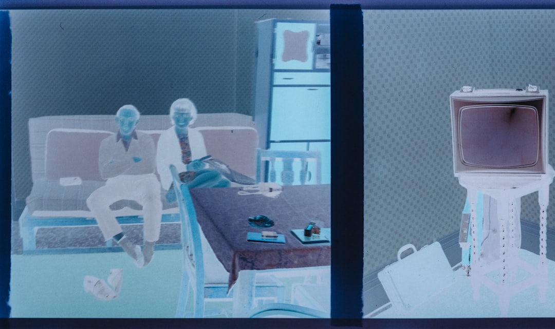 Medical AI command center with holographic patient data floating above sleek diagnostic equipment, UpToDate interface on transparent screens, ambient clinical lighting, doctor reviewing precision medi