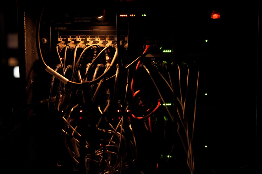 Split-screen comparison: left side traditional server rack with tangled cables and dim lighting, right side sleek modern AI microchip with glowing neural pathways and holographic interface, dramatic c