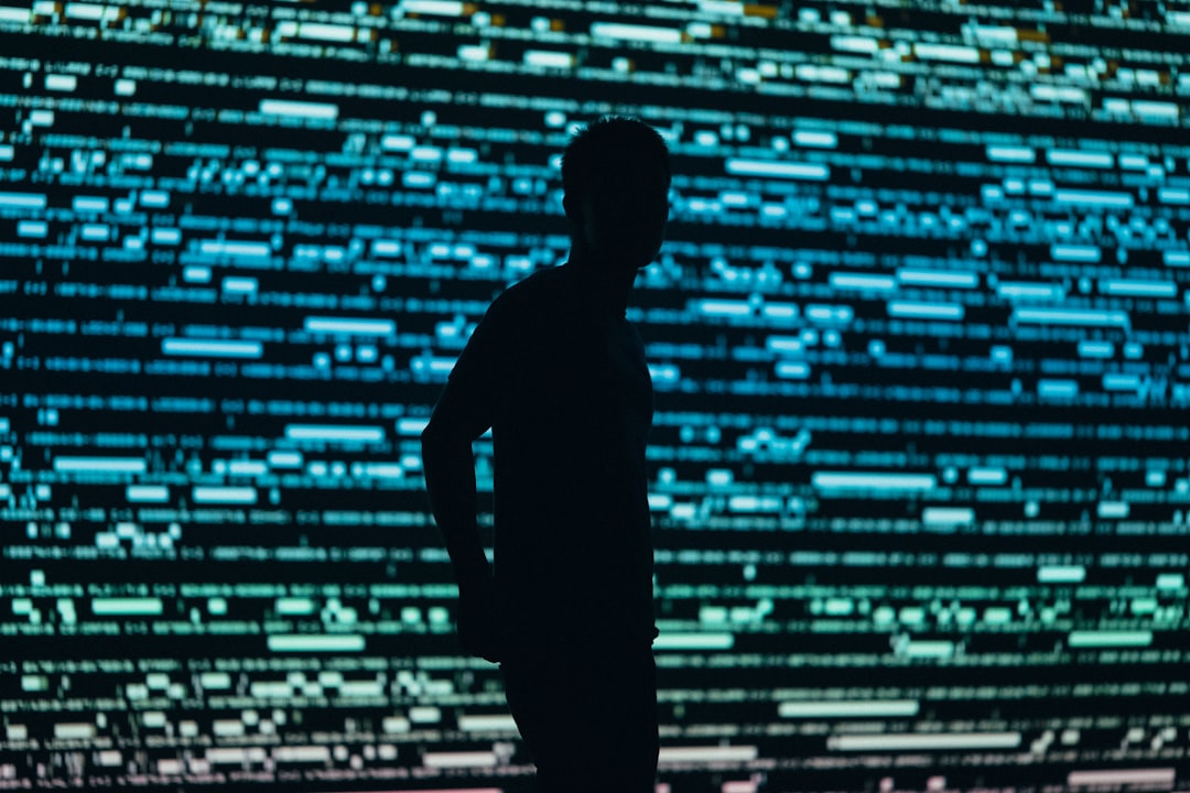 Robotics and human silhouette against massive data center, microchip detail foreground, dramatic cool lighting, AI ethics concept visualization, industry transformation mood