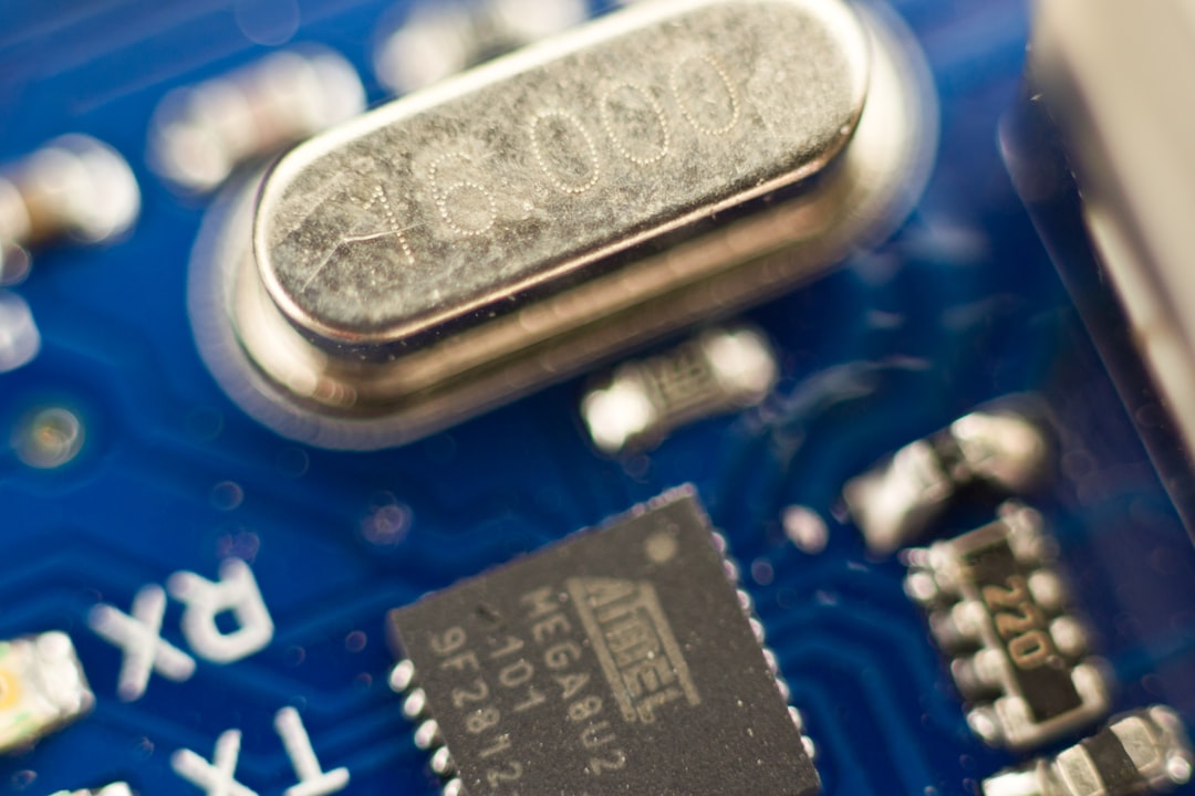 Close-up of microchip detail with flowing data streams and circuit board patterns illuminated by dramatic teal and orange ambient server room lighting