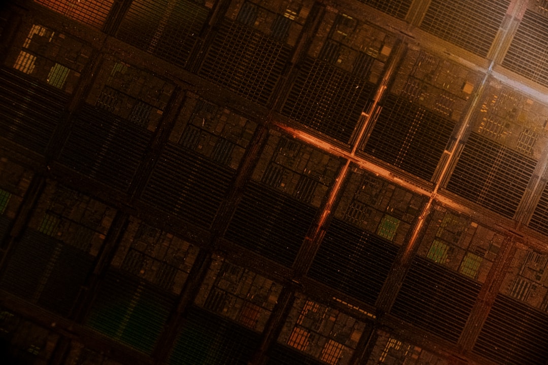 Close-up of advanced GPU microchip with intricate circuitry illuminated by ethereal green and gold light, rows of server racks fading into bokeh background, data center with sleek industrial design, m