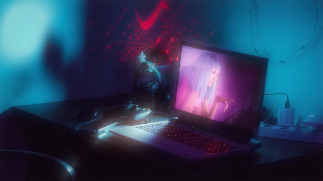 Futuristic autonomous AI agent hologram emerging from sleek laptop screen in clean modern office with ambient blue lighting and professional coder silhouette