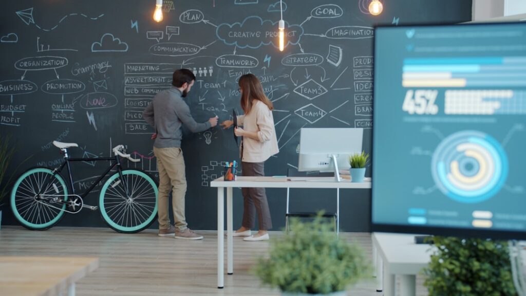 Futuristic corporate boardroom with holographic data displays showing investment graphs, diverse professionals in sleek suits, ambient blue lighting, clean modern office, financial technology concept