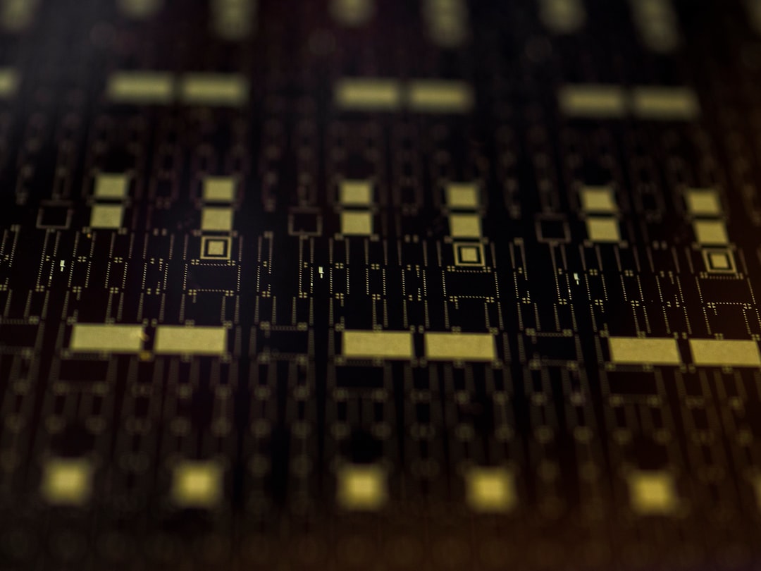 Extreme macro photography of specialized AI microchip with neural network patterns etched in silicon, golden circuit traces glowing under precision lighting, clean room environment, futuristic semicon