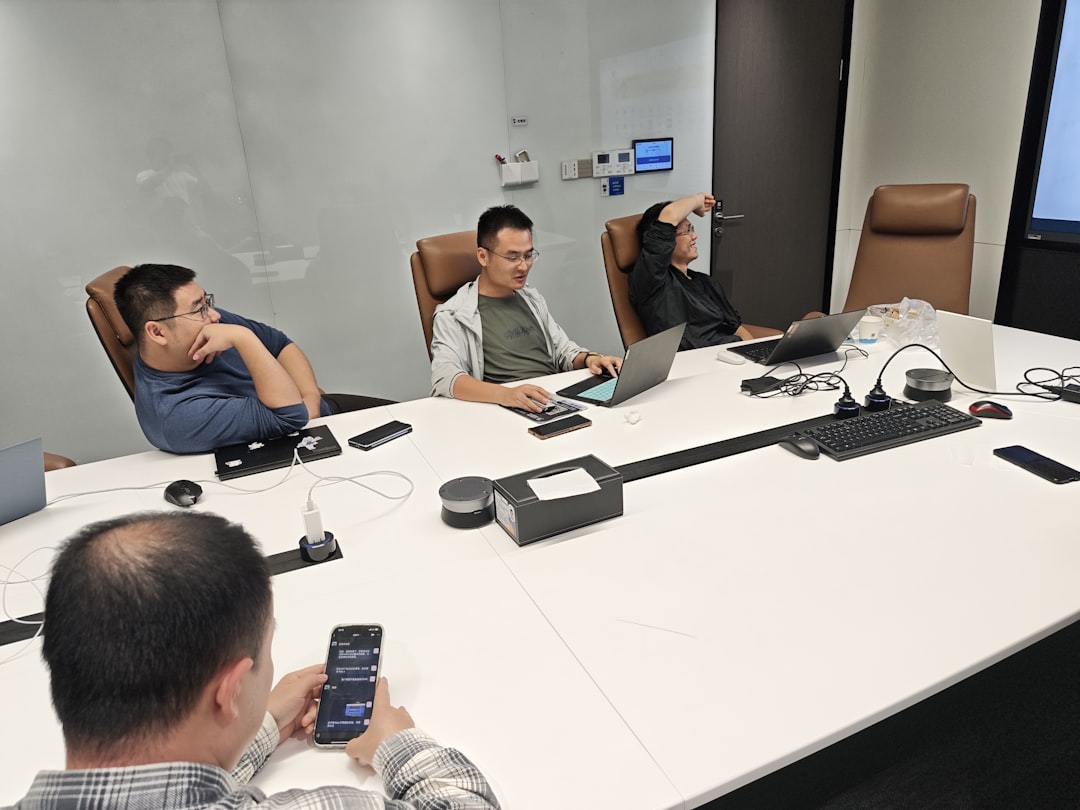 Diverse team of professionals gathered around sleek conference table with holographic governance flowcharts floating above, warm ambient futuristic lighting