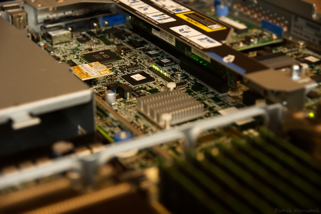 Split-screen comparison of complex chaotic server rack versus compact elegant microchip detail, professional business analyst reviewing cost charts on transparent display, neutral corporate lighting