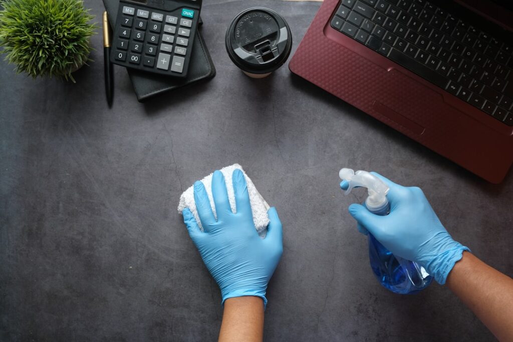 Small business owner at clean modern office desk, holographic data analytics floating above laptop, warm ambient lighting, professional tech environment, shallow depth of field, Wired editorial style