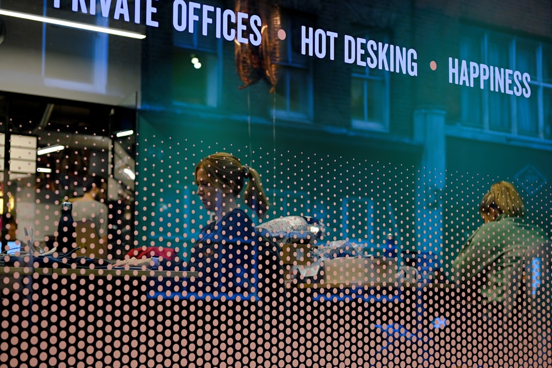 AI ethics policymaking scene, diverse professionals around holographic legal framework display, clean modern government office, warm ambient light, futuristic