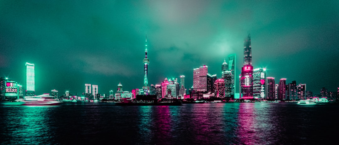 Futuristic Latin American city skyline at dusk with holographic neural network overlay, ambient teal and amber lighting, sleek professional tech aesthetic, data streams connecting skyscrapers, global