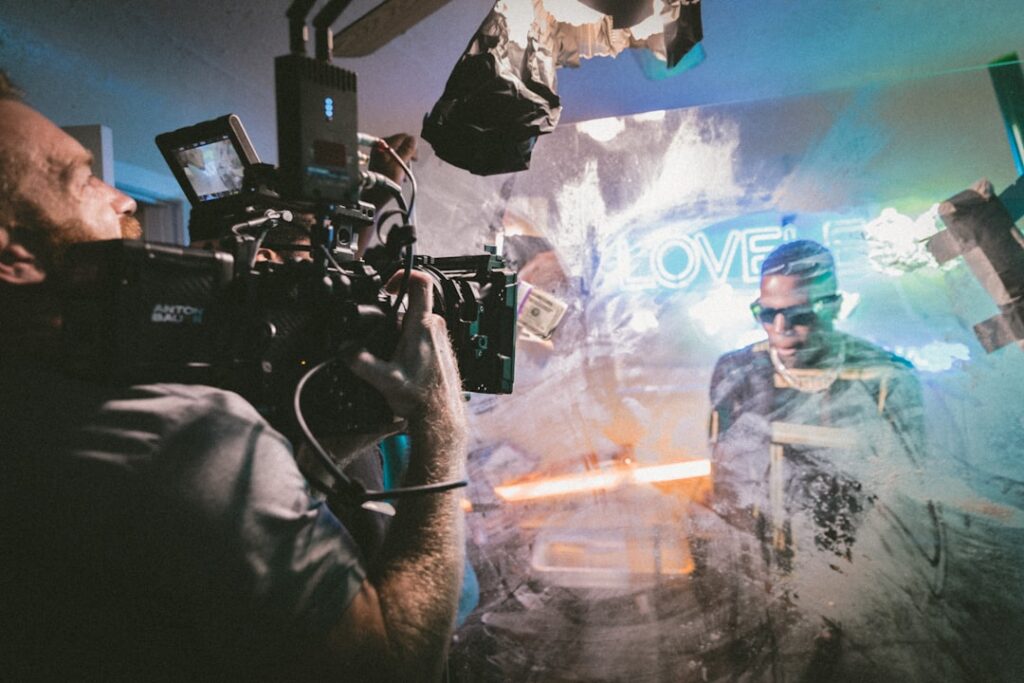 Futuristic film production studio with holographic AI interface displays, professional cinematographer interacting with generative neural network visualization, sleek ambient blue lighting, clean mode