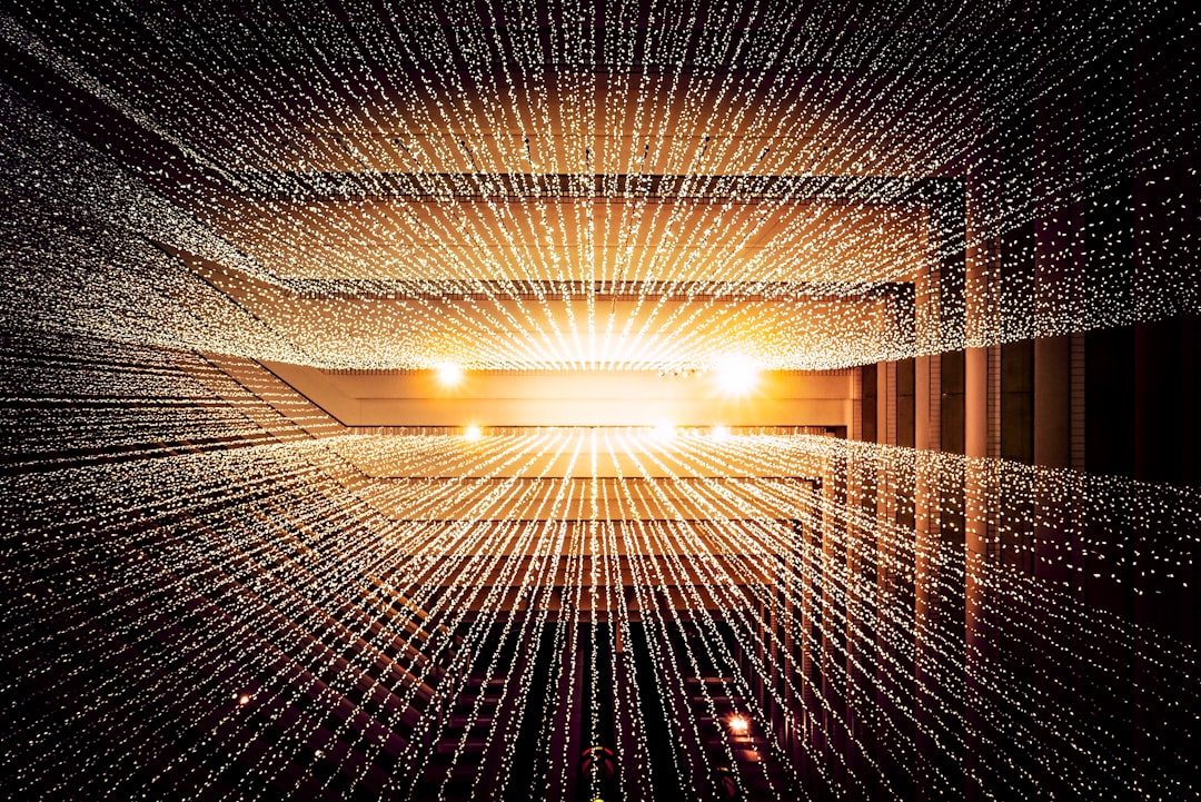 Futuristic holographic data streams dissolving into scattered pixels, skeptical professional in sleek ambient-lit server room, cool blue and warning amber tones, editorial tech photography