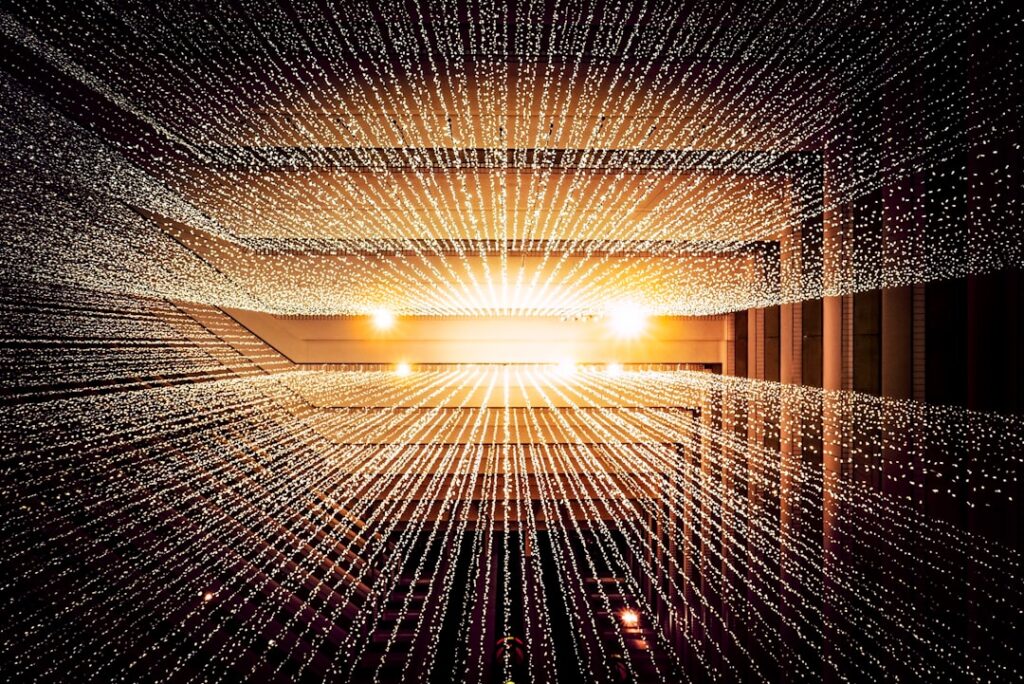 Futuristic holographic data streams dissolving into scattered pixels, skeptical professional in sleek ambient-lit server room, cool blue and warning amber tones, editorial tech photography