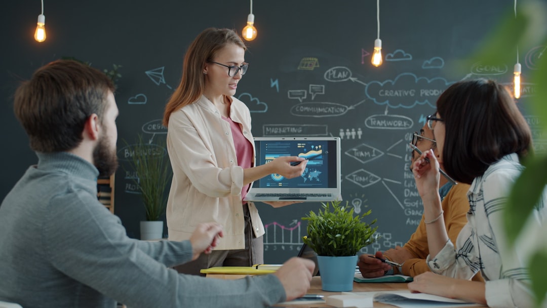 Close-up of diverse professionals examining transparent digital screen showing algorithmic decision tree, dramatic side lighting, AI ethics concept with human faces reflected in data visualization, mo