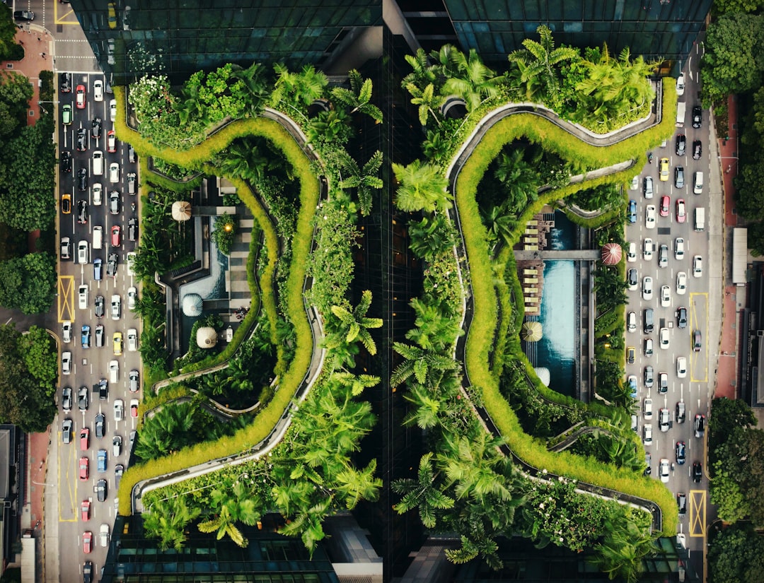 Aerial view of sustainable hyperscale data center nestled in lush South American mountains, solar panels gleaming, cooling towers emitting clean vapor, golden hour lighting, sleek architecture, green 