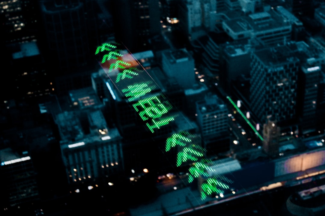 Aerial view of bustling futuristic business district at twilight with holographic market data projections overlaying skyline, sleek professional atmosphere, warm and cool contrasting ambient lighting,
