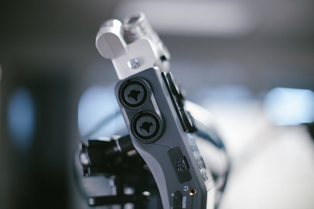 Human-robot collaboration in medical AI setting, surgeon with robotic surgical arm, clean modern hospital environment, soft ambient lighting, futuristic healthcare technology in professional action sc