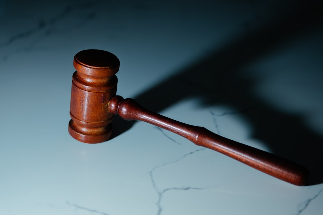 Balanced composition of judge's gavel merging with glowing microchip and AI neural pathways, warm golden and cool blue dual lighting, justice scales hologram, modern courthouse interior