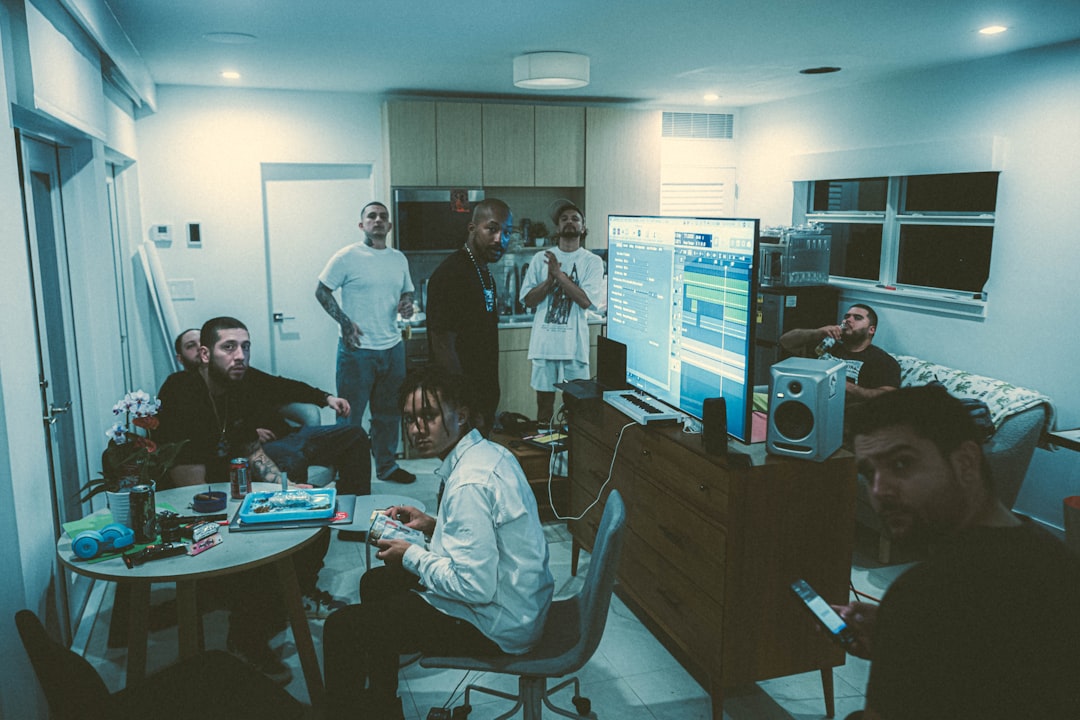 Diverse professionals gathered around holographic display showing global AI ethics concept with interconnected regulation nodes, warm and cool contrast lighting, serious collaborative mood