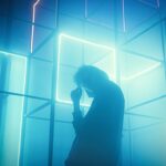Professional examining holographic AI brain interface with warning alerts in dark futuristic data center with ambient blue lighting