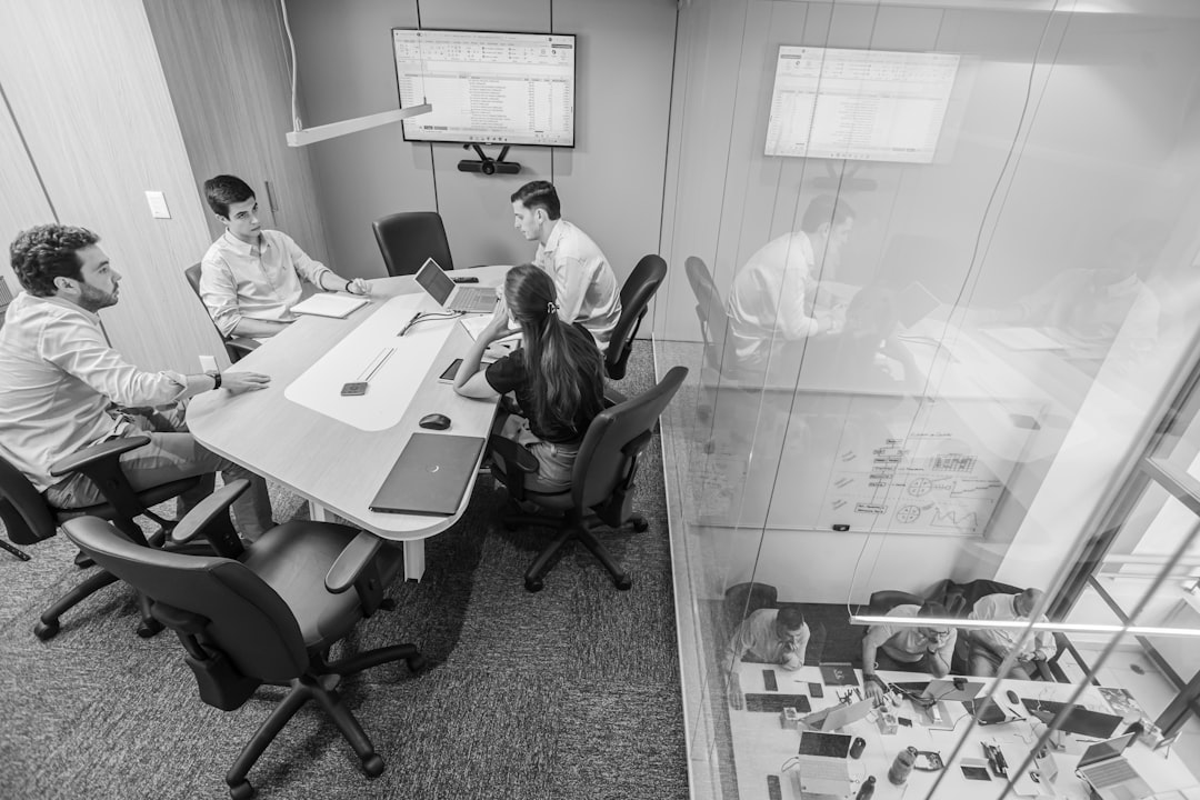 Sleek corporate boardroom with transparent screens showing tech company logos and profit share graphs, diverse professionals in discussion, clean modern office with ambient neon accents