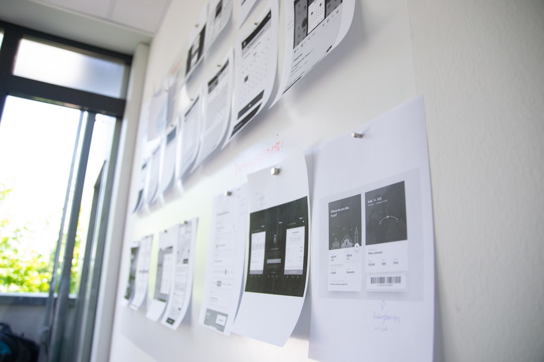 Clean modern office with professional examining framed AI certification badges on wall, holographic display showing skill progression, warm ambient lighting, confident posture, career advancement conc