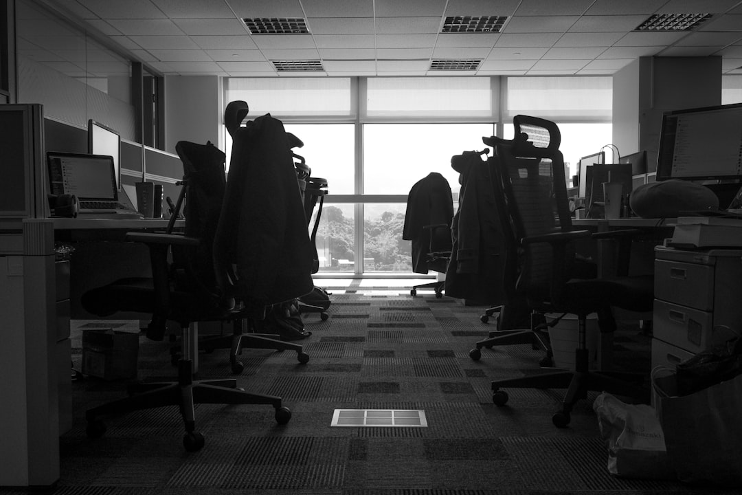 Split composition showing analog office dissolving into digital agent swarm, robotics and coding interfaces, dramatic transition lighting, futuristic professional workspace