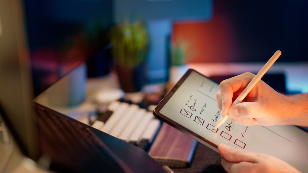 Close-up of human hand and robotic arm jointly holding stylus over digital tablet, soft golden hour lighting through modern office windows, symbolizing harmonious human-AI collaboration