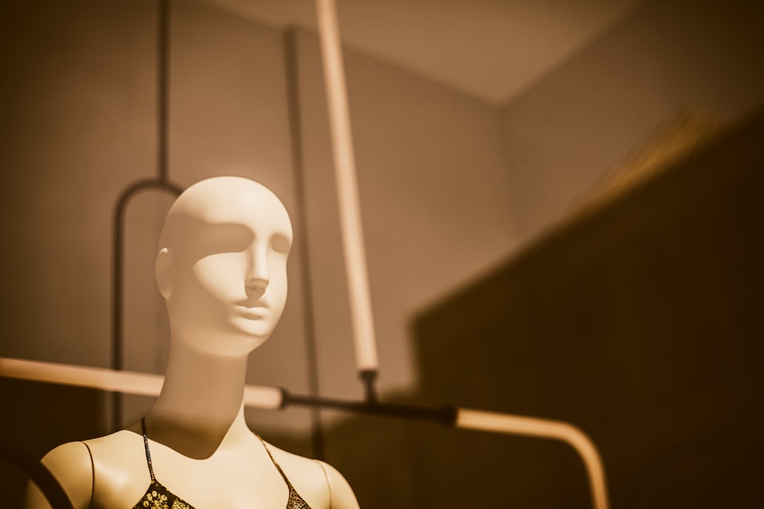 Split-screen composition: left side shows elegant human-robot collaboration in a futuristic lab with warm golden ambient lighting, right side depicts chaotic tangled wires and malfunctioning robotic a