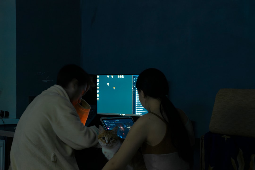 Medical AI and coding interface with diverse professionals collaborating in clean modern office, holographic data visualization floating above tablet, warm inclusive lighting, microchip detail in fore