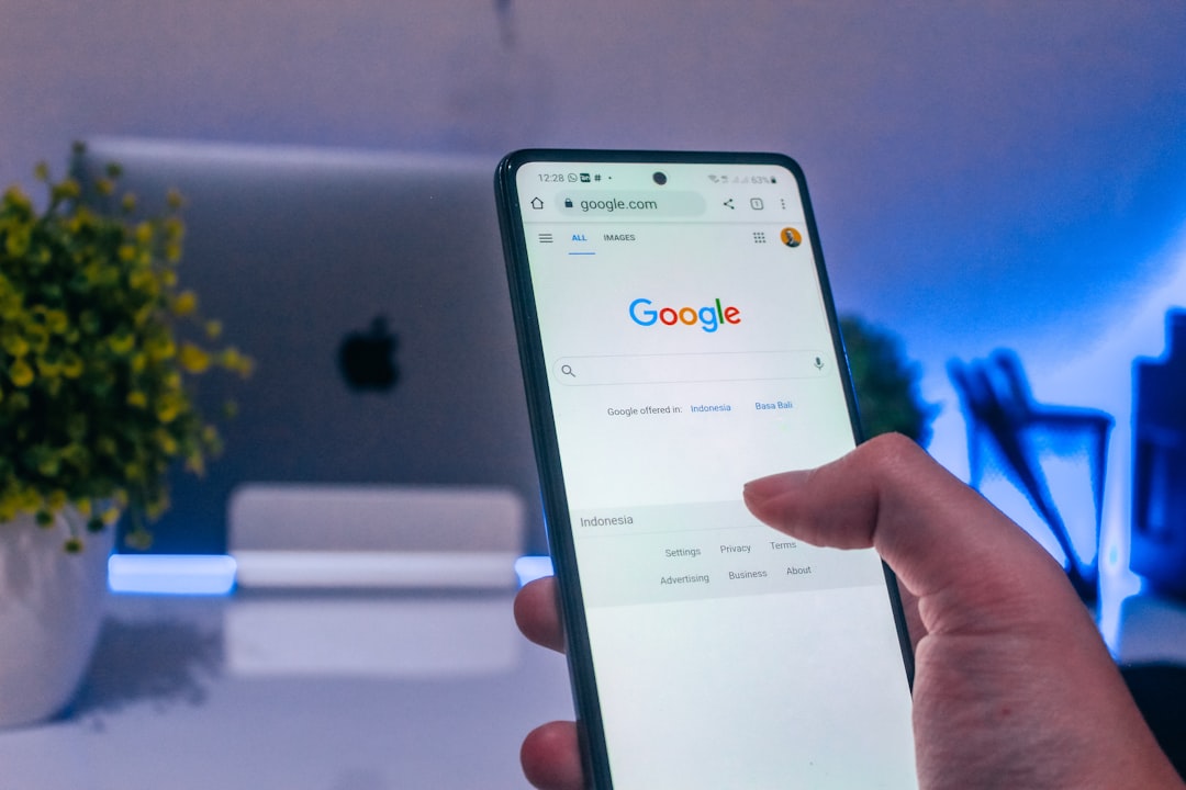 Futuristic holographic Google Ads dashboard floating above sleek desk, professional analyzing data with ambient blue lighting, clean modern office, neural network visualization overlay, small business