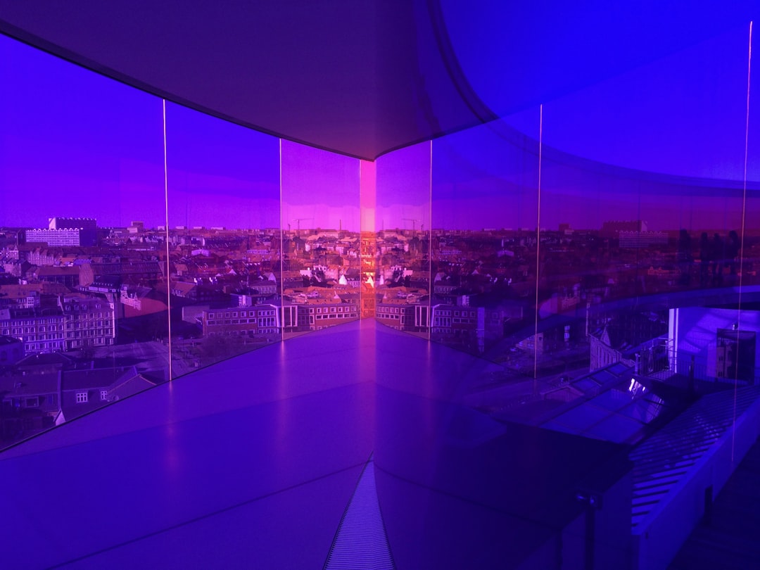 Sleek futuristic Brazilian city apartment at dawn, person hesitantly interacting with holographic AI assistant, cool blue ambient lighting, neural network visualization reflected in window, mood of qu