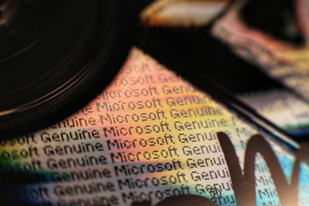 Extreme close-up of advanced Microsoft-branded microchip with neural pathways, sleek minimalist laboratory setting, soft diffused white and blue ambient lighting, holographic proprietary code floating