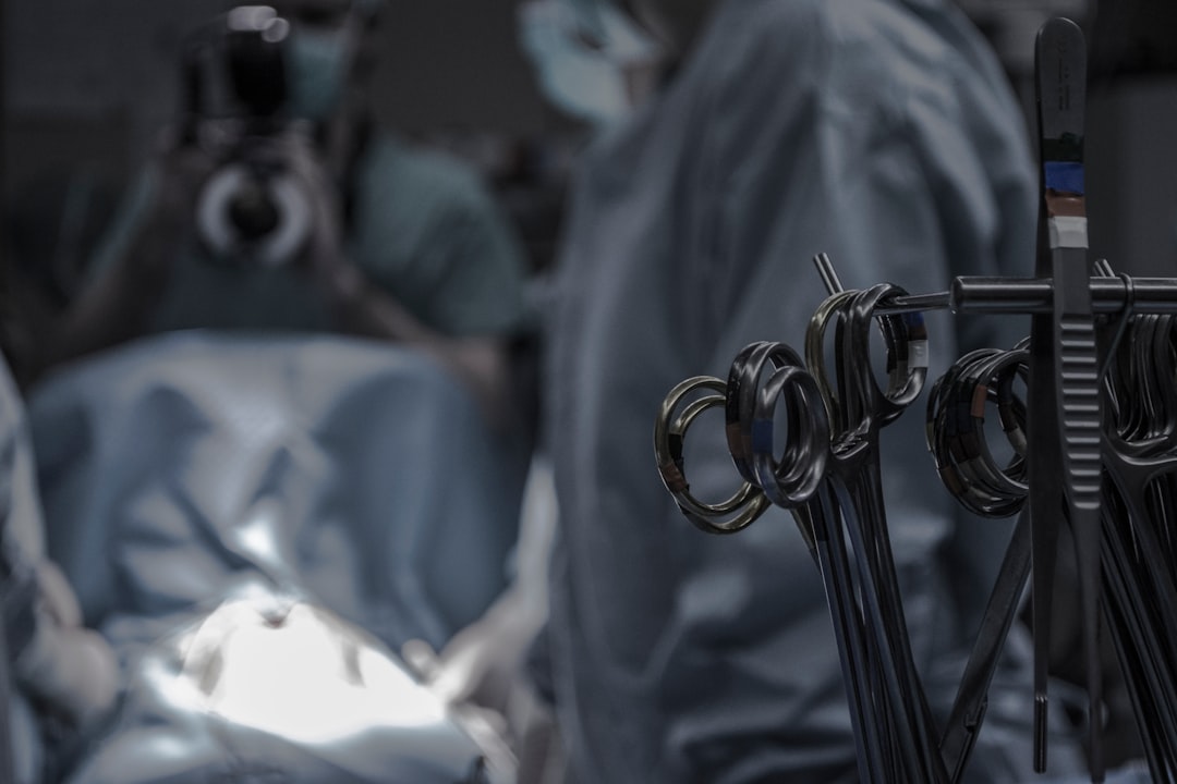 Medical AI concept: robotic surgical arm with holographic patient scan overlay, sterile futuristic operating theater, soft ambient lighting with cyan and warm white balance, human surgeon collaboratin