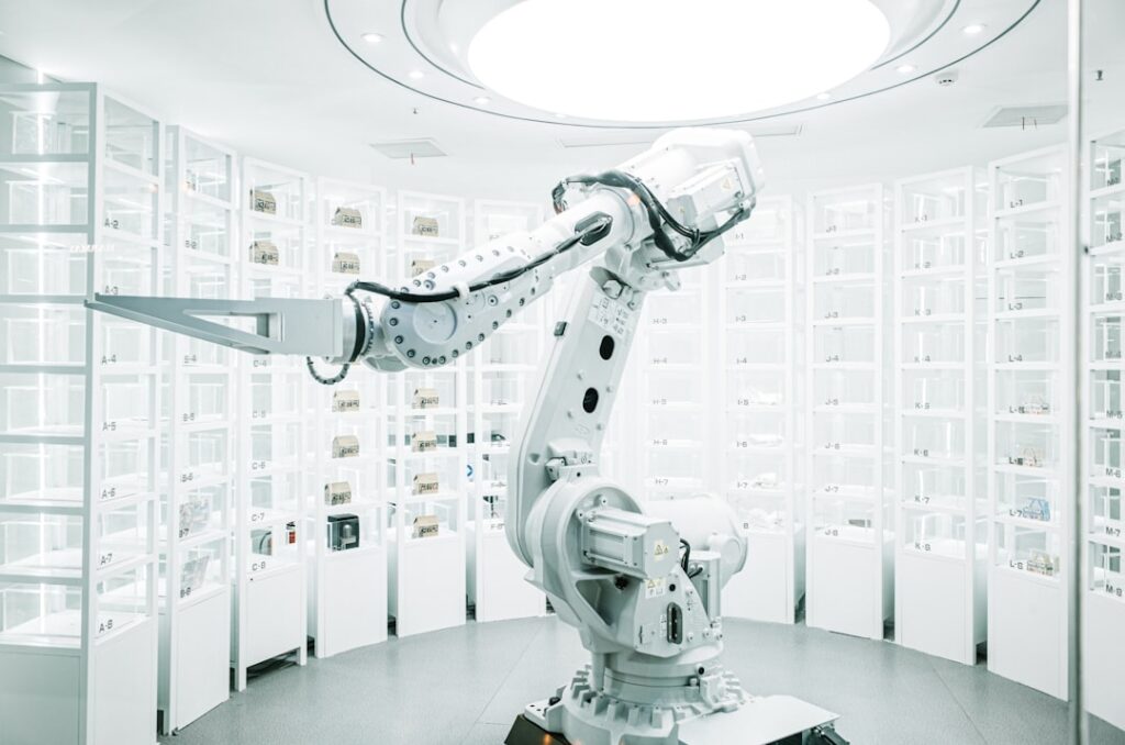 Futuristic pharmaceutical lab with robotic arm holding glowing molecule, holographic drug data floating above, sleek white surfaces, cool blue ambient lighting, scientist observing in background