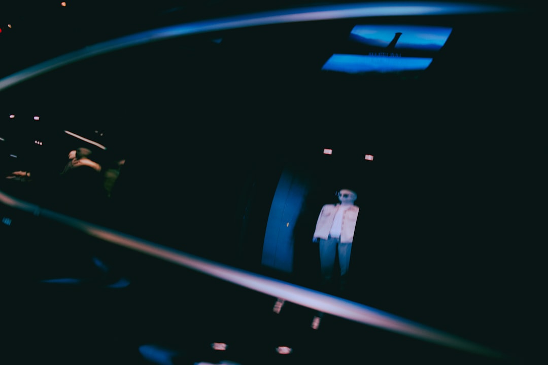 Business executive and data scientist examining holographic market projection above sleek conference table, warm accent lighting, floor-to-ceiling windows with cityscape, 2026 digital interface elemen