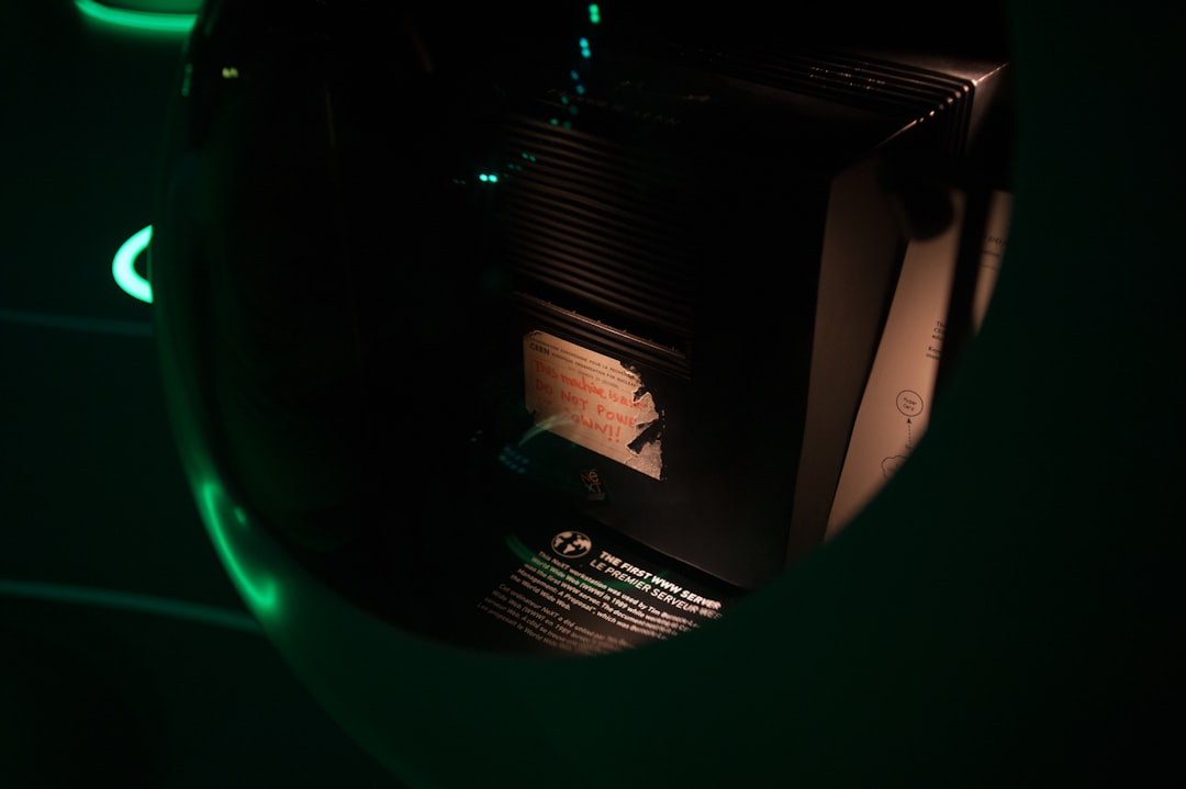 Executive examining glowing microchip with holographic cost-benefit analysis, dramatic blue amber lighting, server room background, innovation versus economy concept, sleek futuristic, thoughtful deci