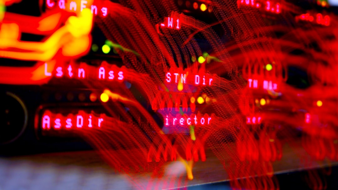 Cybersecurity dashboard with red alert nodes on massive curved screen, server room corridor stretching into darkness, professional technician silhouette, cool ambient lighting, data center infrastruct
