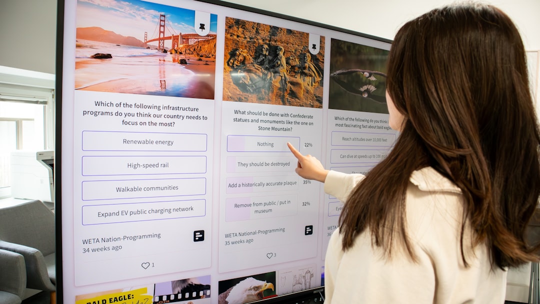 Woman interacting with immersive holographic multimodal display, gesture control, floating UI elements, sleek minimalist environment, soft ambient glow, futuristic user experience concept
