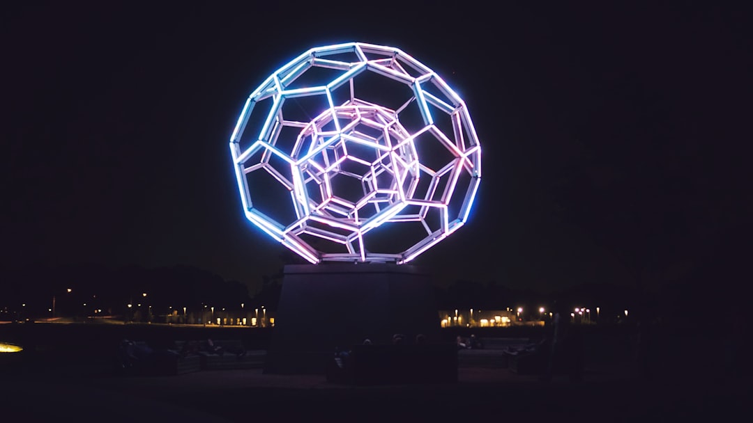 Futuristic soccer referee wearing AR smart glasses with holographic VAR overlay, sleek stadium lighting, neural network data visualization floating in air, professional sports tech aesthetic, ambient