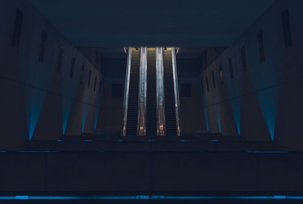 futuristic holographic display of five glowing pillars representing AI strategy, sleek glass conference room, ambient blue lighting, professional government setting, data visualization floating in air